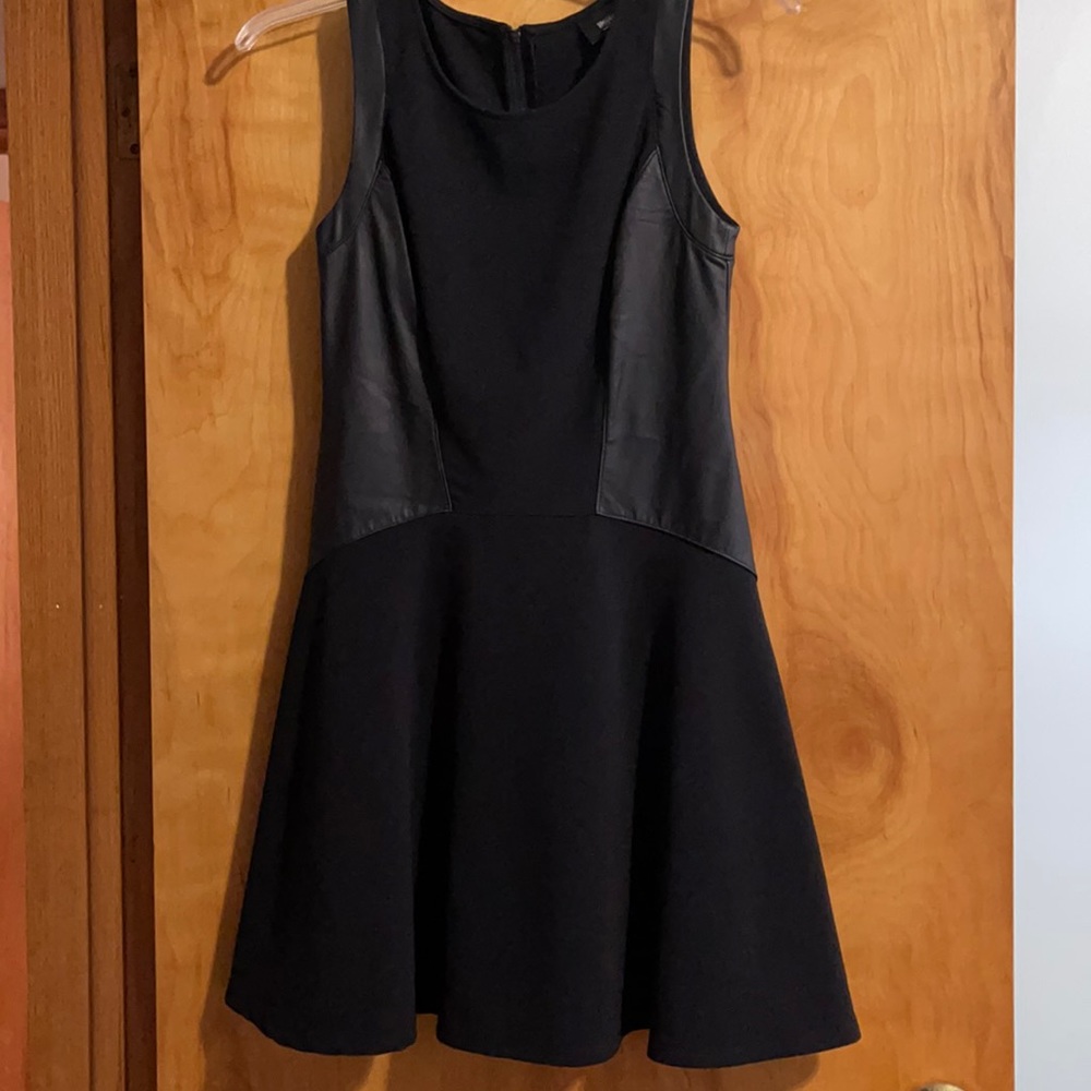 Black tank dress with faux leather sides and trim